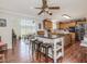 Well-equipped kitchen with island and stainless steel appliances at 557 Olives Chapel Rd, Apex, NC 27502