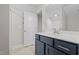 Modern bathroom with dark vanity and shower at 182 Oleander Ln, Sanford, NC 27332