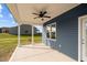 Covered patio with ceiling fan and concrete flooring at 182 Oleander Ln, Sanford, NC 27332