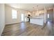Modern kitchen with white cabinets, granite counters, and an island at 123 Johnson Ridge Way, Four Oaks, NC 27524