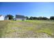 Oversized lot with grassy areas and distant homes at 123 Johnson Ridge Way, Four Oaks, NC 27524