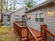 Home exterior showcasing a deck and grassy backyard at 1905 Wagoner St, Durham, NC 27705
