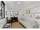 Bright office with built-in shelving and comfortable seating at 1905 Wagoner St, Durham, NC 27705