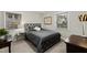 Spacious bedroom with double bed and large windows at 1905 Wagoner St, Durham, NC 27705