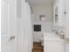 Clean bathroom with white vanity, quartz countertop, and shower/tub combo at 1905 Wagoner St, Durham, NC 27705
