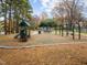 Community playground with swings, slides, and play area for  at 1905 Wagoner St, Durham, NC 27705