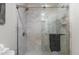 Bathroom with marble shower, glass enclosure, and modern fixtures at 1905 Wagoner St, Durham, NC 27705