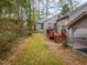 Home exterior showcasing a deck and grassy backyard at 1905 Wagoner St, Durham, NC 27705