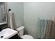 Clean bathroom with a single sink and toilet at 513 N Carr St, Mebane, NC 27302