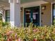 Elegant clubhouse entrance with double doors and landscaping at 75 Bur Oak Ct, Pittsboro, NC 27312