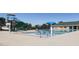Community swimming pool with water slide and mushroom fountain at 75 Bur Oak Ct, Pittsboro, NC 27312