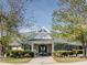 Community clubhouse with inviting entrance and landscaping at 75 Bur Oak Ct, Pittsboro, NC 27312
