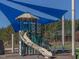 Play area with covered structure and slide at 75 Bur Oak Ct, Pittsboro, NC 27312