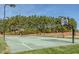 Outdoor basketball court with two hoops at 75 Bur Oak Ct, Pittsboro, NC 27312