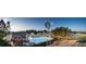 Aerial view of community pool, clubhouse, and homes at 165 Inspiration Way, Fuquay Varina, NC 27526