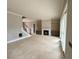 Living area with fireplace and built-in shelving at 165 Inspiration Way, Fuquay Varina, NC 27526