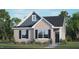 Two story home with gray brick and blue accents at 800 Dorset Stream Dr, Fuquay Varina, NC 27526