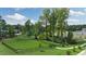 Fenced dog park with grassy area and bench at 800 Dorset Stream Dr, Fuquay Varina, NC 27526