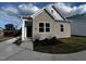 Gray brick ranch home with landscaping and walkway at 800 Dorset Stream Dr, Fuquay Varina, NC 27526