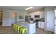 Modern kitchen with white cabinets, stainless steel appliances, and island at 2824 Egert Dr, Haw River, NC 27258