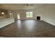 Spacious living room with hardwood floors, fireplace and access to the kitchen at 90 Watermelon Dr, Franklinton, NC 27525