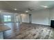 Spacious living room with hardwood floors, fireplace, and ceiling fan at 90 Watermelon Dr, Franklinton, NC 27525