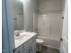 Clean bathroom featuring a bathtub, vanity with white countertop, and tile floor at 90 Watermelon Dr, Franklinton, NC 27525