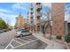 Building exterior with parking and retail spaces at 3201 Environ Way # Bldg 3000, Chapel Hill, NC 27517