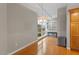 Spacious dining area with hardwood floors and large windows at 3201 Environ Way # Bldg 3000, Chapel Hill, NC 27517