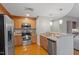 Modern kitchen featuring stainless steel appliances and light wood cabinets at 3201 Environ Way # Bldg 3000, Chapel Hill, NC 27517