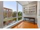 Bright home office features built-in shelving and large windows at 3201 Environ Way # Bldg 3000, Chapel Hill, NC 27517