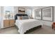 Spacious bedroom with a king-size bed and large windows at 723 Dorset Stream Dr, Fuquay Varina, NC 27526