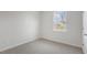 Simple bedroom with carpeted floors and a window at 723 Dorset Stream Dr, Fuquay Varina, NC 27526