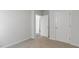 Bright bedroom with carpet flooring and double door closet at 723 Dorset Stream Dr, Fuquay Varina, NC 27526