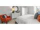 Spacious bedroom featuring a comfortable armchair and ample storage at 723 Dorset Stream Dr, Fuquay Varina, NC 27526