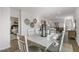 Bright dining room with a light wooden table and six chairs at 723 Dorset Stream Dr, Fuquay Varina, NC 27526