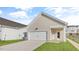 Single car garage with a covered patio at 723 Dorset Stream Dr, Fuquay Varina, NC 27526