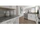 Open concept kitchen boasting granite counters and stainless steel dishwasher at 723 Dorset Stream Dr, Fuquay Varina, NC 27526