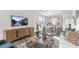 Open concept living space with a view into the dining area at 723 Dorset Stream Dr, Fuquay Varina, NC 27526