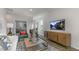 Spacious living area with a media console and comfortable seating at 723 Dorset Stream Dr, Fuquay Varina, NC 27526