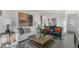 Living room with white sofa and two armchairs, coffee table and decor at 723 Dorset Stream Dr, Fuquay Varina, NC 27526