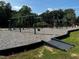 playground with swings and climbing structures at 723 Dorset Stream Dr, Fuquay Varina, NC 27526