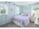 Bedroom with light purple bedding and decorative pillows at 8916 Stratus St, Willow Springs, NC 27592