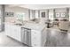 Open concept kitchen with island, stainless steel appliances and breakfast area at 8813 Tartan Clan Dr, Willow Springs, NC 27592