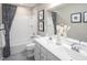Bathroom with double vanity, bathtub, and shower at 8813 Tartan Clan Dr, Willow Springs, NC 27592