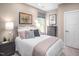 Charming bedroom with a dresser and large bed at 8813 Tartan Clan Dr, Willow Springs, NC 27592