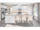 Modern kitchen with stainless steel appliances and an island at 8813 Tartan Clan Dr, Willow Springs, NC 27592