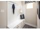 Functional mudroom with bench, cubbies and hooks at 8813 Tartan Clan Dr, Willow Springs, NC 27592