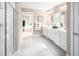 Double vanity bathroom with a large shower and plenty of storage at 8813 Tartan Clan Dr, Willow Springs, NC 27592
