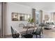 Elegant dining room with a large rectangular table and black chairs at 2232 Cherry Top Dr, Fuquay Varina, NC 27526